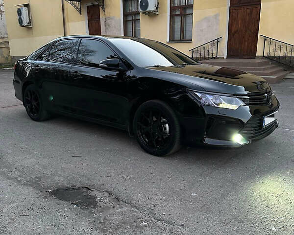 Черный Тойота Камри, объемом двигателя 2.49 л и пробегом 174 тыс. км за 16700 $, фото 1 на Automoto.ua