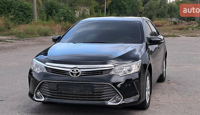 Чорний Тойота Камрі, об'ємом двигуна 2.5 л та пробігом 141 тис. км за 15400 $, фото 1 на Automoto.ua