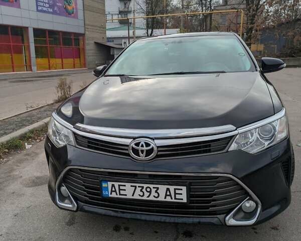 Черный Тойота Камри, объемом двигателя 2.49 л и пробегом 205 тыс. км за 19000 $, фото 1 на Automoto.ua