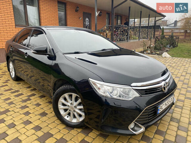 Черный Тойота Камри, объемом двигателя 2.4 л и пробегом 238 тыс. км за 15400 $, фото 1 на Automoto.ua
