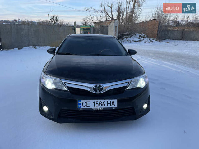 Чорний Тойота Камрі, об'ємом двигуна 2.5 л та пробігом 209 тис. км за 13500 $, фото 1 на Automoto.ua
