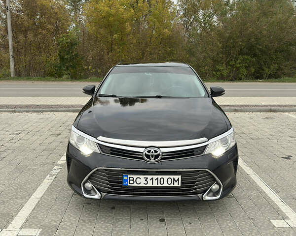 Черный Тойота Камри, объемом двигателя 2.49 л и пробегом 280 тыс. км за 15200 $, фото 1 на Automoto.ua