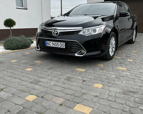 Чорний Тойота Камрі, об'ємом двигуна 2.5 л та пробігом 237 тис. км за 16000 $, фото 1 на Automoto.ua