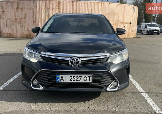 Черный Тойота Камри, объемом двигателя 2.49 л и пробегом 134 тыс. км за 15500 $, фото 1 на Automoto.ua