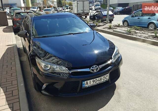 Черный Тойота Камри, объемом двигателя 2.49 л и пробегом 186 тыс. км за 14300 $, фото 1 на Automoto.ua