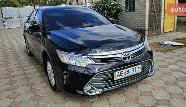 Черный Тойота Камри, объемом двигателя 2.49 л и пробегом 167 тыс. км за 17000 $, фото 1 на Automoto.ua