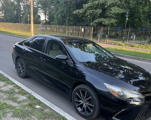Чорний Тойота Камрі, об'ємом двигуна 2.5 л та пробігом 186 тис. км за 14700 $, фото 1 на Automoto.ua