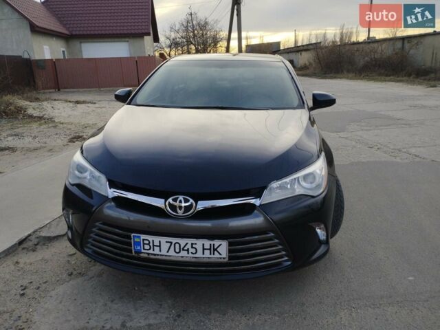 Чорний Тойота Камрі, об'ємом двигуна 2.49 л та пробігом 60 тис. км за 15325 $, фото 1 на Automoto.ua