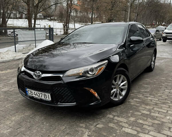 Черный Тойота Камри, объемом двигателя 2.49 л и пробегом 282 тыс. км за 11300 $, фото 1 на Automoto.ua