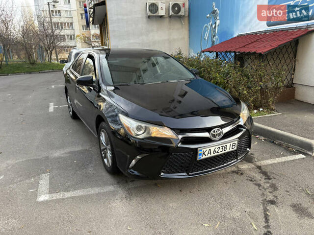 Черный Тойота Камри, объемом двигателя 2.49 л и пробегом 216 тыс. км за 13300 $, фото 1 на Automoto.ua