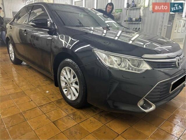Черный Тойота Камри, объемом двигателя 2.49 л и пробегом 183 тыс. км за 15400 $, фото 1 на Automoto.ua