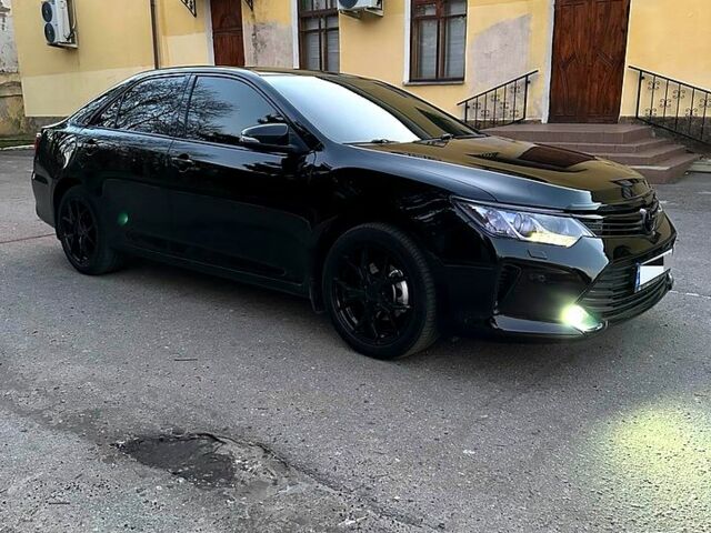 Черный Тойота Камри, объемом двигателя 2.5 л и пробегом 174 тыс. км за 16700 $, фото 1 на Automoto.ua