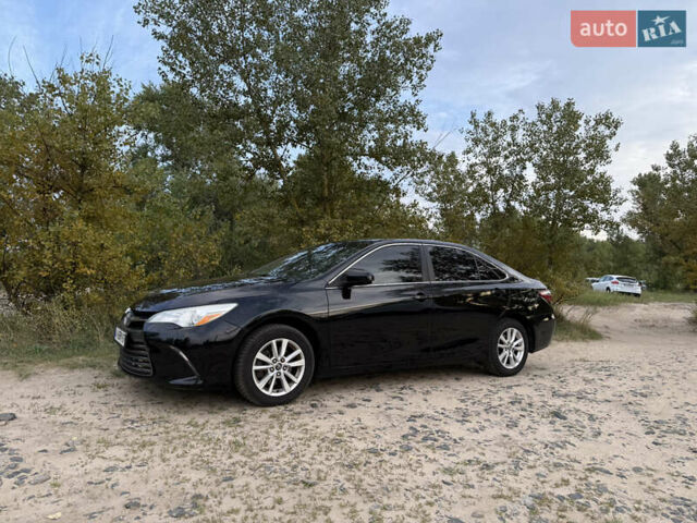 Черный Тойота Камри, объемом двигателя 2.49 л и пробегом 171 тыс. км за 14500 $, фото 1 на Automoto.ua