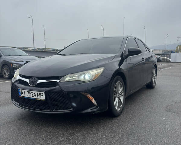 Черный Тойота Камри, объемом двигателя 2.5 л и пробегом 143 тыс. км за 12900 $, фото 1 на Automoto.ua