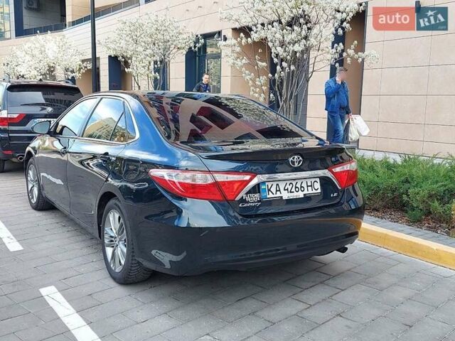 Черный Тойота Камри, объемом двигателя 2.49 л и пробегом 119 тыс. км за 13000 $, фото 1 на Automoto.ua