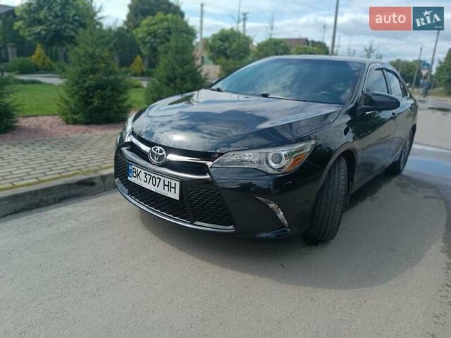Черный Тойота Камри, объемом двигателя 2.5 л и пробегом 174 тыс. км за 14500 $, фото 1 на Automoto.ua
