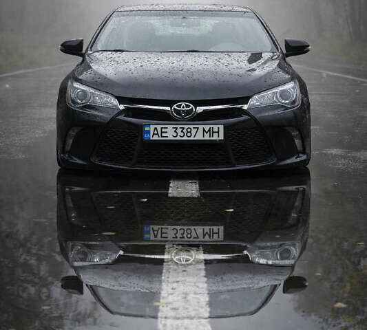 Черный Тойота Камри, объемом двигателя 2.5 л и пробегом 145 тыс. км за 14500 $, фото 1 на Automoto.ua