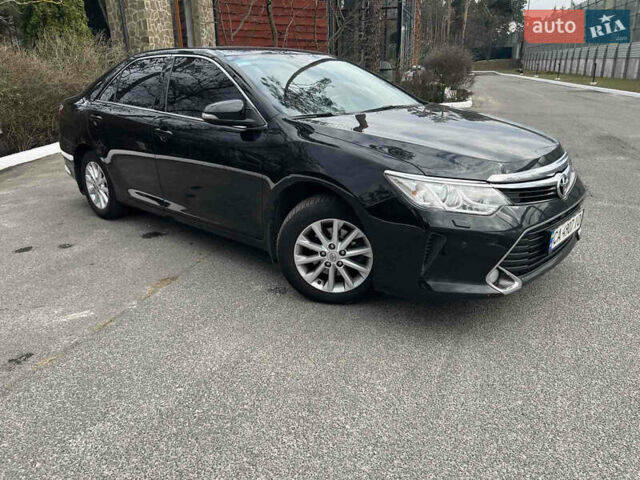 Черный Тойота Камри, объемом двигателя 2.49 л и пробегом 260 тыс. км за 16500 $, фото 1 на Automoto.ua