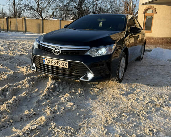 Чорний Тойота Камрі, об'ємом двигуна 2.49 л та пробігом 135 тис. км за 16900 $, фото 1 на Automoto.ua