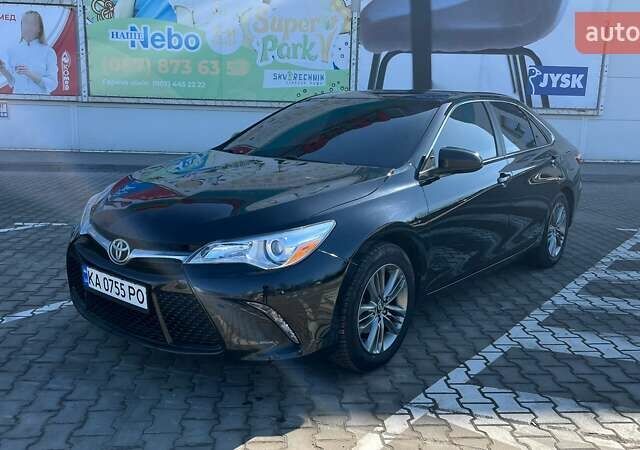 Чорний Тойота Камрі, об'ємом двигуна 2.49 л та пробігом 146 тис. км за 14800 $, фото 1 на Automoto.ua