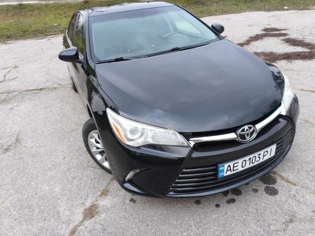 Черный Тойота Камри, объемом двигателя 2.5 л и пробегом 105 тыс. км за 11700 $, фото 1 на Automoto.ua