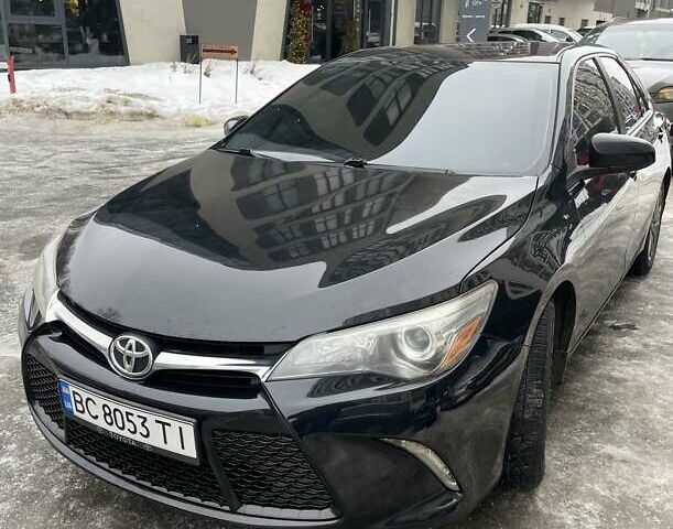 Черный Тойота Камри, объемом двигателя 2.49 л и пробегом 213 тыс. км за 14199 $, фото 1 на Automoto.ua