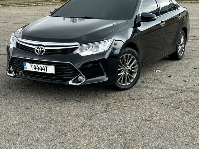 Черный Тойота Камри, объемом двигателя 2.5 л и пробегом 185 тыс. км за 17000 $, фото 1 на Automoto.ua