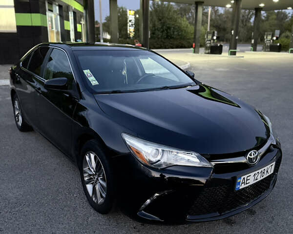Чорний Тойота Камрі, об'ємом двигуна 2.49 л та пробігом 164 тис. км за 12699 $, фото 1 на Automoto.ua