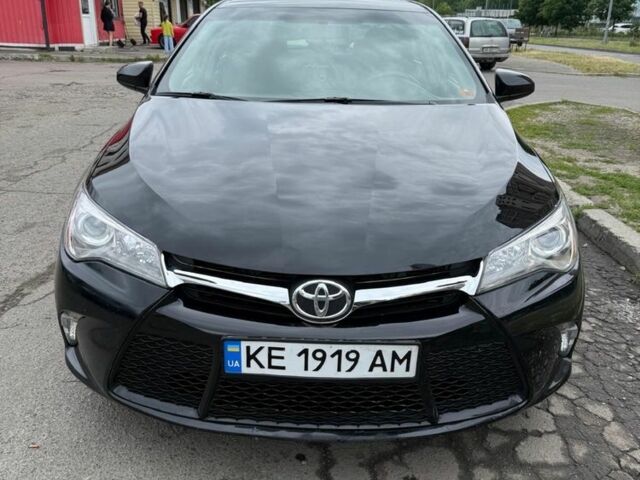 Черный Тойота Камри, объемом двигателя 2.5 л и пробегом 142 тыс. км за 13700 $, фото 1 на Automoto.ua