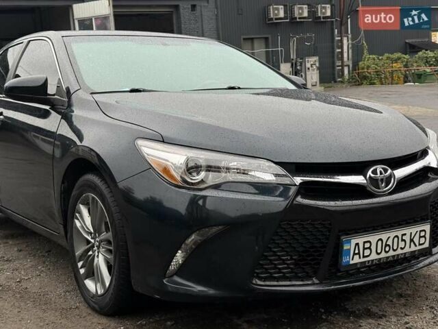 Чорний Тойота Камрі, об'ємом двигуна 2.49 л та пробігом 75 тис. км за 12900 $, фото 1 на Automoto.ua