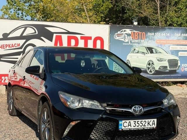 Черный Тойота Камри, объемом двигателя 2.49 л и пробегом 150 тыс. км за 12700 $, фото 1 на Automoto.ua