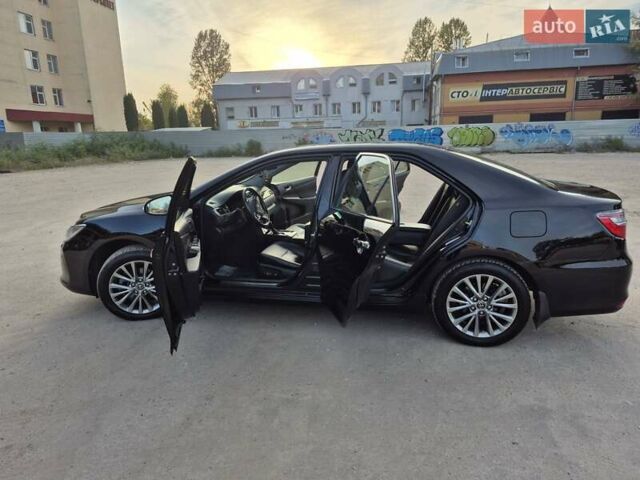 Черный Тойота Камри, объемом двигателя 2.49 л и пробегом 132 тыс. км за 19500 $, фото 1 на Automoto.ua