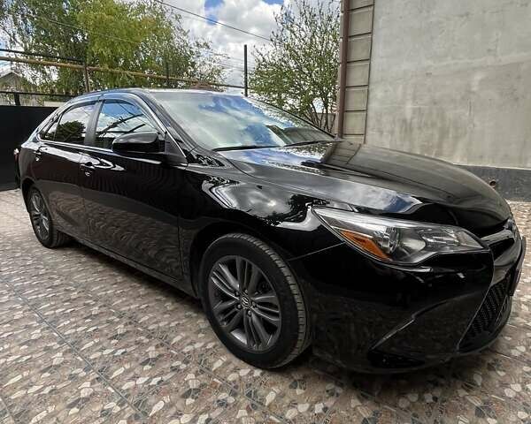 Черный Тойота Камри, объемом двигателя 2.49 л и пробегом 120 тыс. км за 15300 $, фото 1 на Automoto.ua