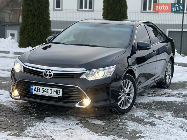 Черный Тойота Камри, объемом двигателя 2.49 л и пробегом 145 тыс. км за 18350 $, фото 1 на Automoto.ua