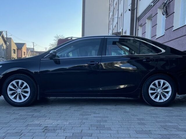 Чорний Тойота Камрі, об'ємом двигуна 2.5 л та пробігом 142 тис. км за 12500 $, фото 1 на Automoto.ua