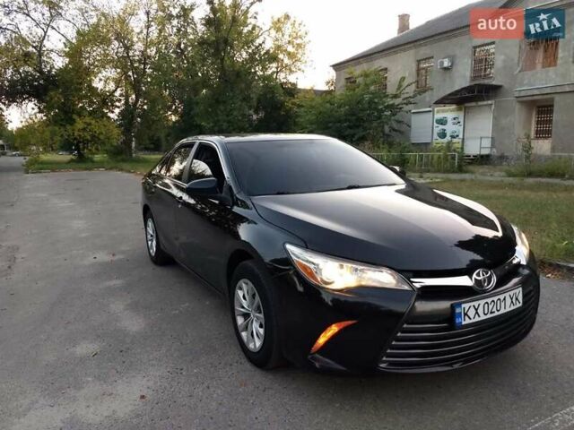 Чорний Тойота Камрі, об'ємом двигуна 2.49 л та пробігом 230 тис. км за 13000 $, фото 1 на Automoto.ua