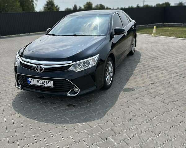 Черный Тойота Камри, объемом двигателя 2.5 л и пробегом 168 тыс. км за 18500 $, фото 1 на Automoto.ua