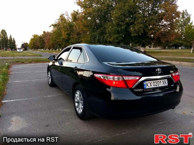 Чорний Тойота Камрі, об'ємом двигуна 2.5 л та пробігом 230 тис. км за 13000 $, фото 1 на Automoto.ua