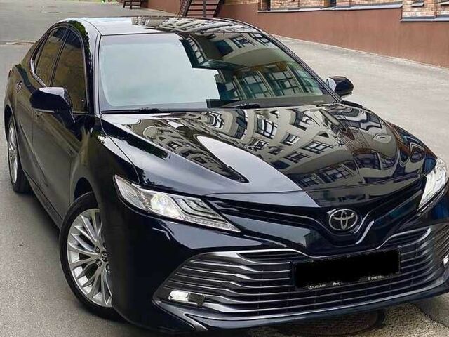 Черный Тойота Камри, объемом двигателя 2.5 л и пробегом 85 тыс. км за 16400 $, фото 1 на Automoto.ua
