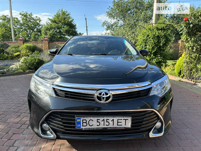 Черный Тойота Камри, объемом двигателя 2.5 л и пробегом 186 тыс. км за 21500 $, фото 1 на Automoto.ua