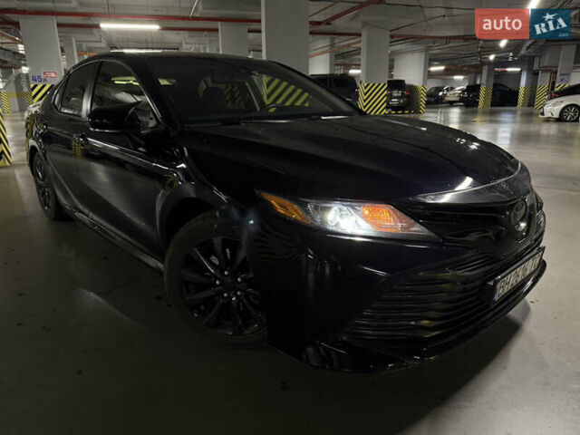 Черный Тойота Камри, объемом двигателя 2.49 л и пробегом 130 тыс. км за 18999 $, фото 1 на Automoto.ua
