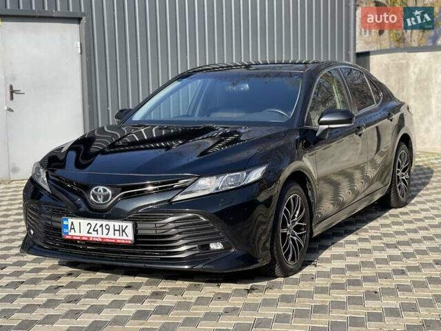 Черный Тойота Камри, объемом двигателя 2.49 л и пробегом 148 тыс. км за 19800 $, фото 1 на Automoto.ua
