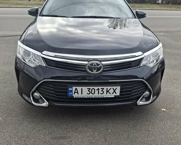 Черный Тойота Камри, объемом двигателя 2.49 л и пробегом 132 тыс. км за 19000 $, фото 1 на Automoto.ua