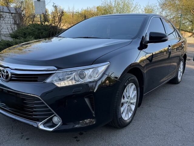 Черный Тойота Камри, объемом двигателя 2.5 л и пробегом 133 тыс. км за 18700 $, фото 1 на Automoto.ua