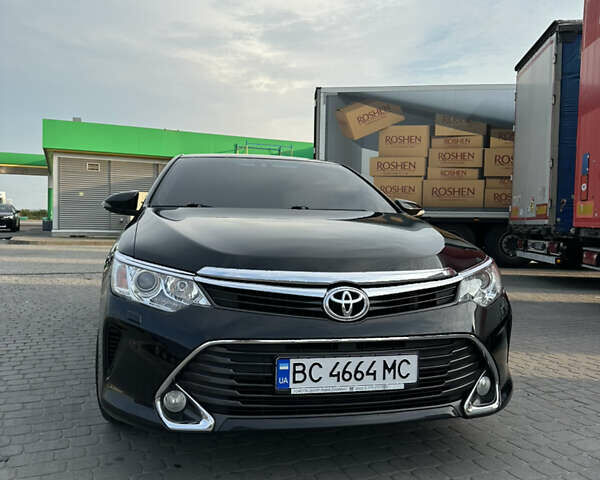 Черный Тойота Камри, объемом двигателя 2.49 л и пробегом 121 тыс. км за 16500 $, фото 1 на Automoto.ua