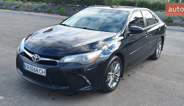 Черный Тойота Камри, объемом двигателя 2.49 л и пробегом 128 тыс. км за 16500 $, фото 1 на Automoto.ua