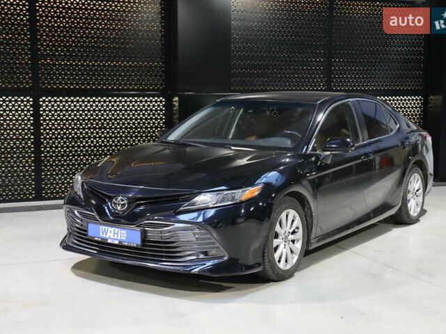 Черный Тойота Камри, объемом двигателя 2.49 л и пробегом 145 тыс. км за 16800 $, фото 1 на Automoto.ua