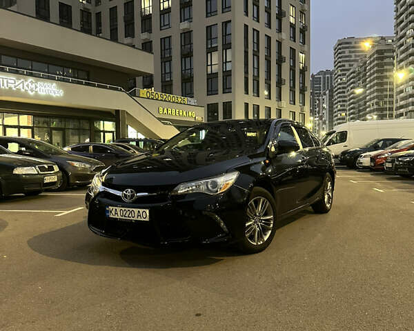 Черный Тойота Камри, объемом двигателя 2.49 л и пробегом 142 тыс. км за 14300 $, фото 1 на Automoto.ua