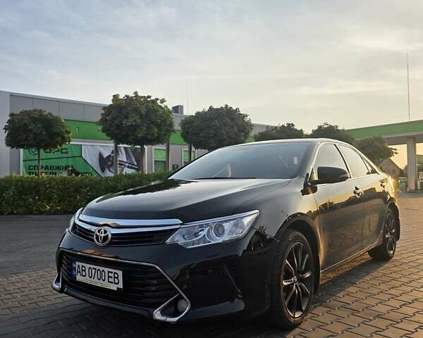Черный Тойота Камри, объемом двигателя 2.49 л и пробегом 125 тыс. км за 17900 $, фото 1 на Automoto.ua