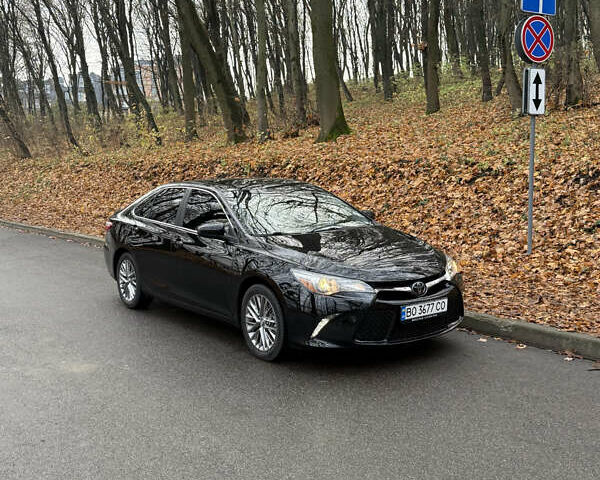 Черный Тойота Камри, объемом двигателя 2.49 л и пробегом 277 тыс. км за 15700 $, фото 1 на Automoto.ua